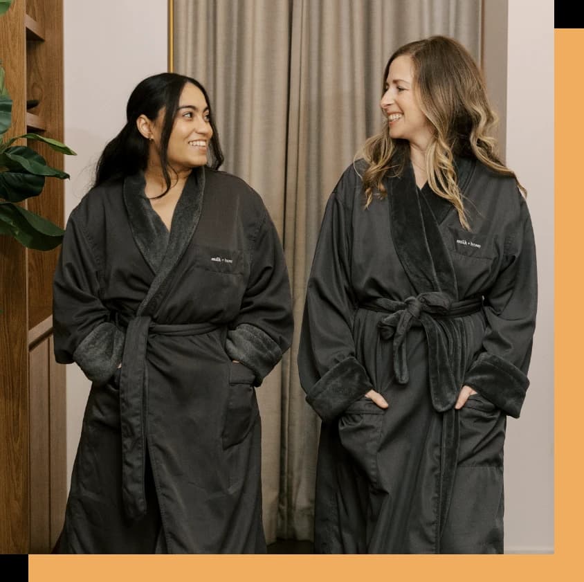 Two guests wearing Imperial Spa & Wellness robes